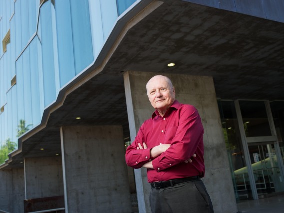 Jim Wyant stands outside of the Wyant College of Optical Sciences, named for the founding dean in 2019.