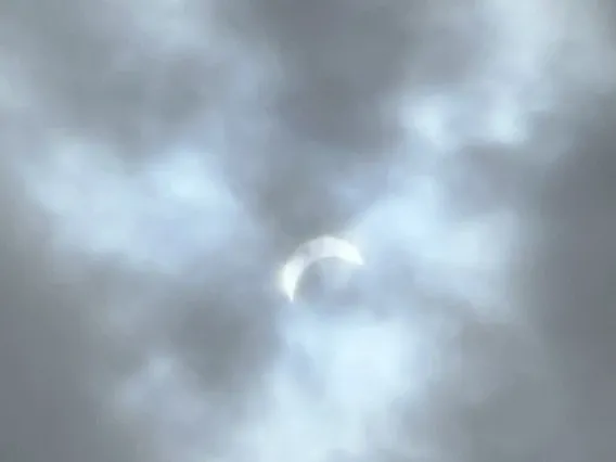 Jannick Rolland-Thompson's view of the solar eclipse in Seneca Falls, NY, Cayuga Lake.