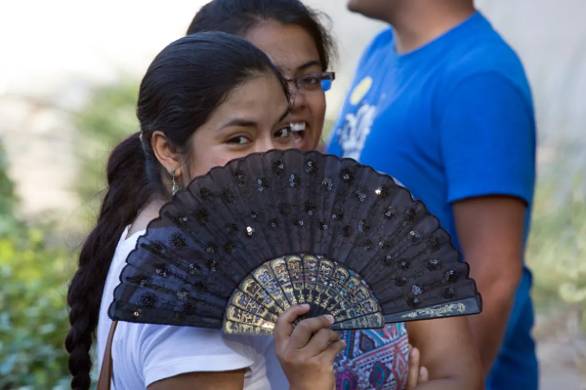 SOCK member holding fan