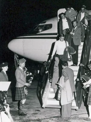 H. Angus Macleod leaving plane