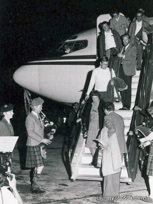 H. Angus Macleod leaving plane