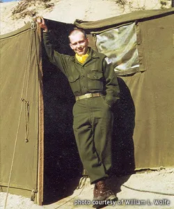 Bill Wolfe outside tent