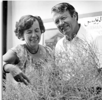 Marjorie and Aden Meinel with tumbleweed