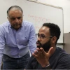 Left to right: Abhijit Mahalanobis with doctoral student Natnael Daba.